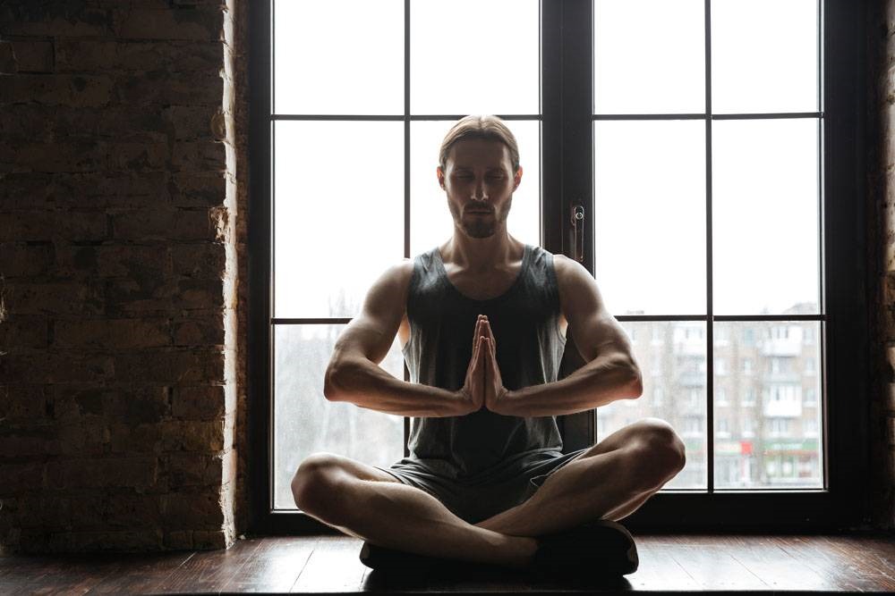 man meditating with palms together - 公开 Michael B. Jordan 为了新电影的海军式锻炼！